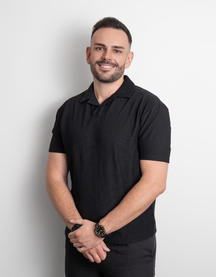 Matthew Hayes principle mortgage broker in front of a light background