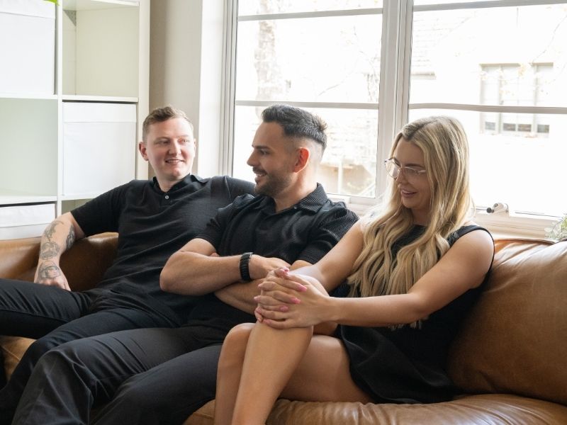 Hayes Financial Team sitting on the couch